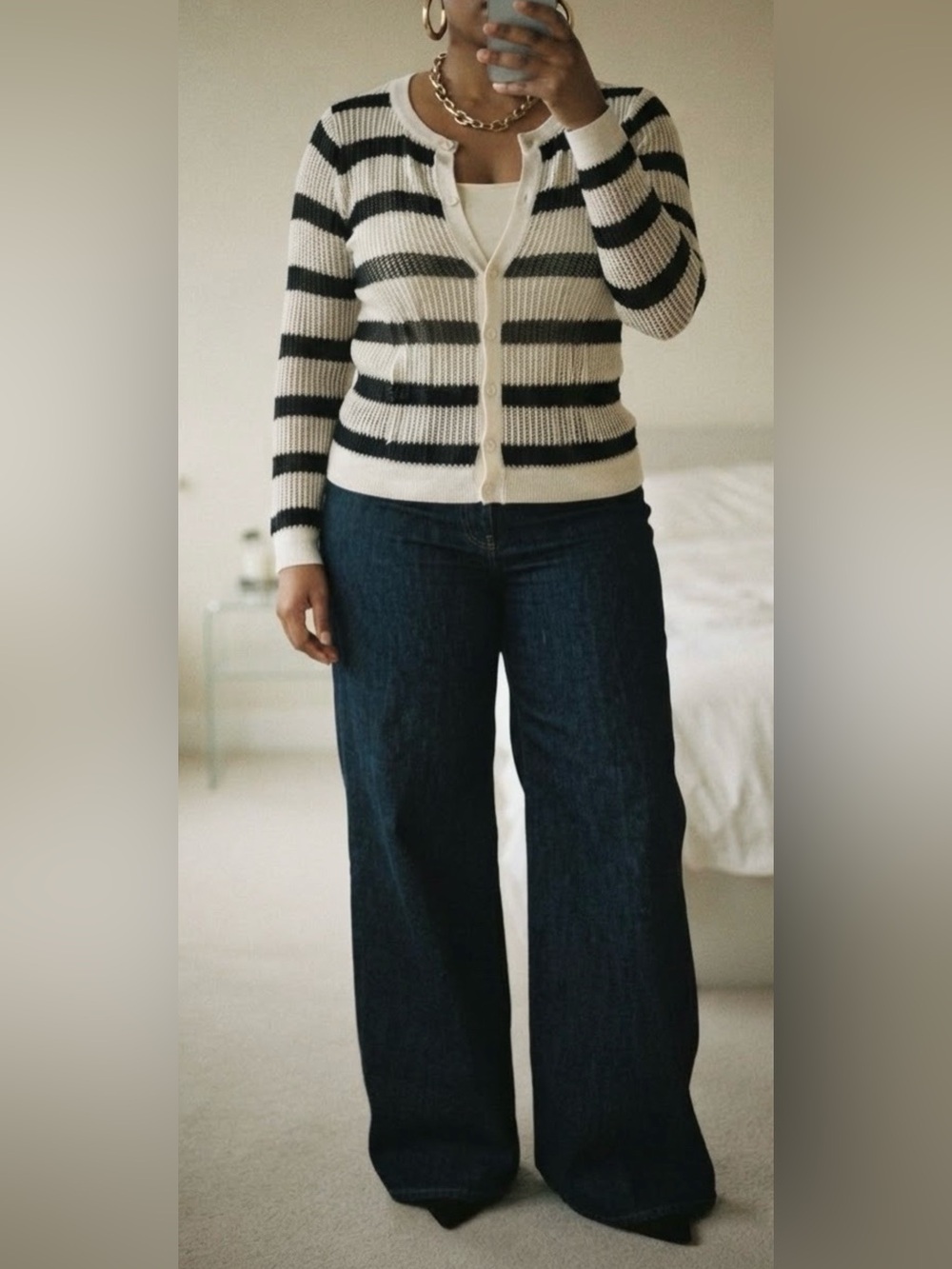 Express Striped Cardigan. 
Black and Cream. Button Front
100% Rayon - Sheer